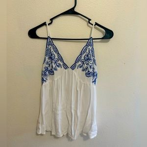 white and blue tank top